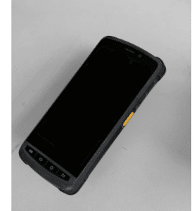 Rugged black smartphone with thick bumper lying on a light gray surface.